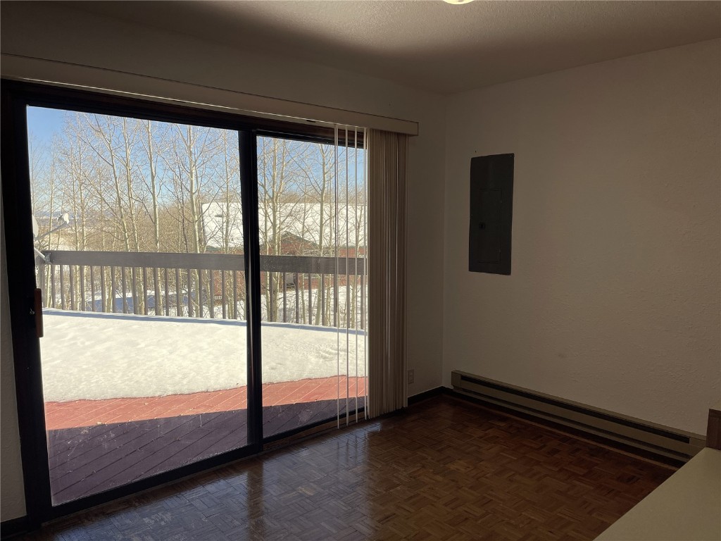 2584 High Creek Road Fairplay, CO 80440 - Photo 7 of 50 a view of empty room with wooden floor and fan
