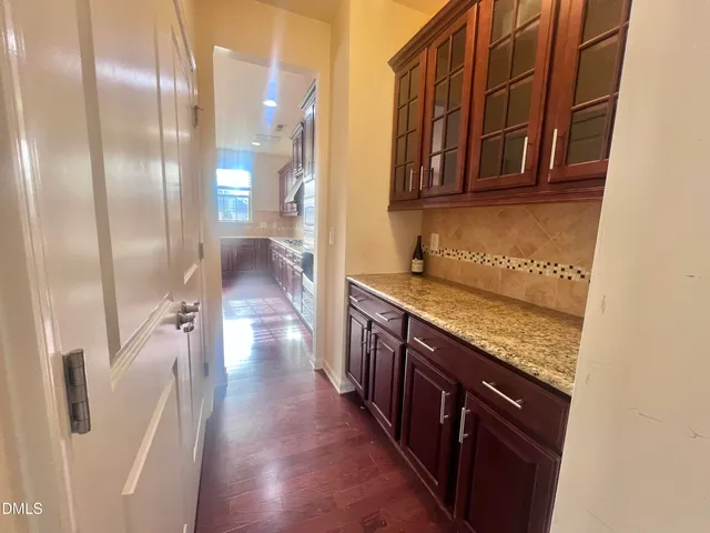 a view of empty room with windows