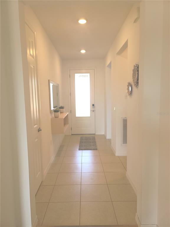 5380 Northwest 43rd Ln Road Ocala, FL 34482 - Photo 14 of 54 a bathroom with a glass door shower