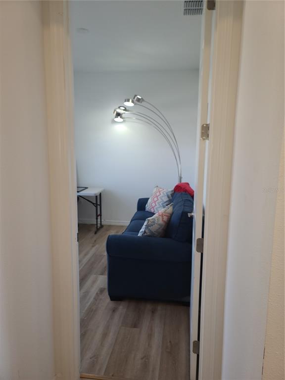 5380 Northwest 43rd Ln Road Ocala, FL 34482 - Photo 16 of 54 a living room with furniture and a lamp