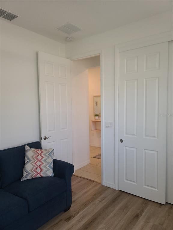 5380 Northwest 43rd Ln Road Ocala, FL 34482 - Photo 18 of 54 a living room with furniture and a potted plant
