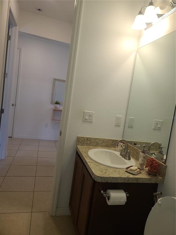 5380 Northwest 43rd Ln Road Ocala, FL 34482 - Photo 21 of 54 a bathroom with a sink and a mirror