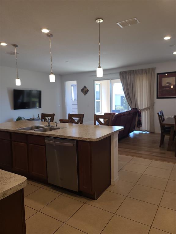 5380 Northwest 43rd Ln Road Ocala, FL 34482 - Photo 29 of 54 a kitchen with a sink a counter space appliances and a window