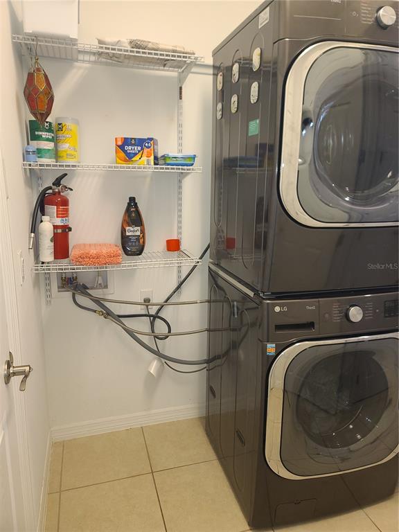 5380 Northwest 43rd Ln Road Ocala, FL 34482 - Photo 32 of 54 a utility room with dryer and washer