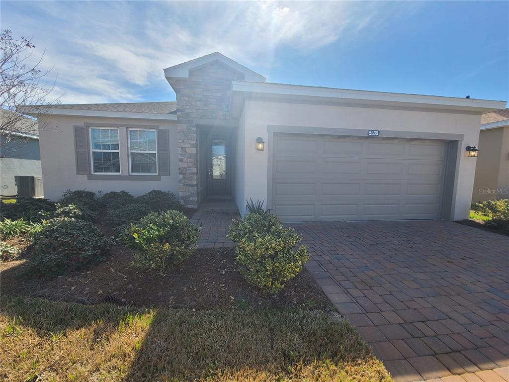5380 Northwest 43rd Ln Road Ocala, FL 34482 - Photo 4 of 54 a front view of a house with garden