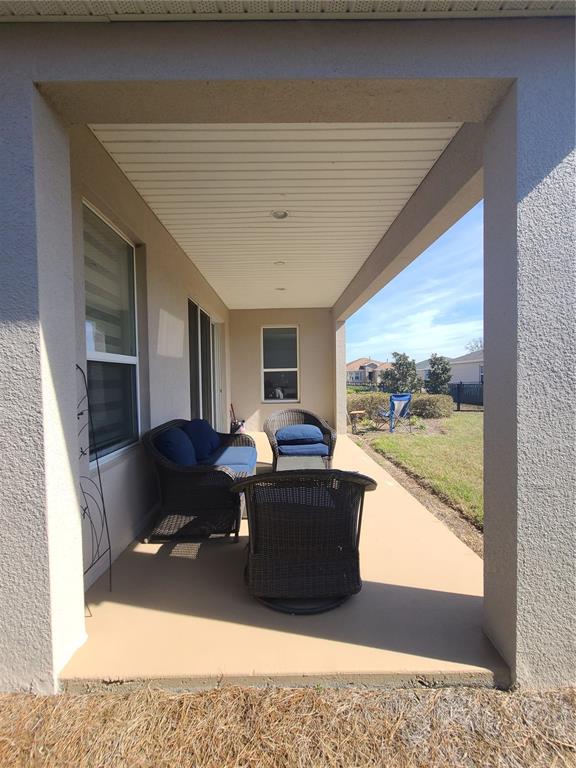 5380 Northwest 43rd Ln Road Ocala, FL 34482 - Photo 54 of 54 a living room with furniture and a large window