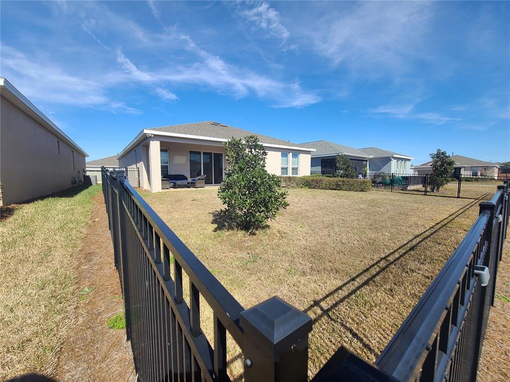 5380 Northwest 43rd Ln Road Ocala, FL 34482 - Photo 8 of 54 a view of a balcony with two chairs