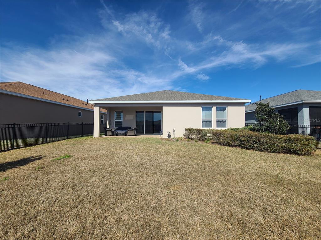 5380 Northwest 43rd Ln Road Ocala, FL 34482 - Photo 10 of 54 front view of a house with a yard
