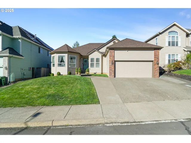 a house with yard in front of it
