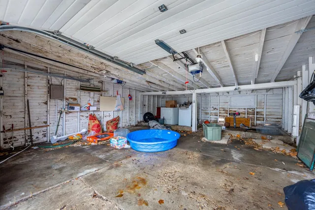 a view of a backyard of the house