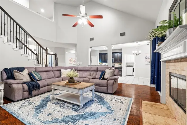 a living room with furniture or couch and a fireplace