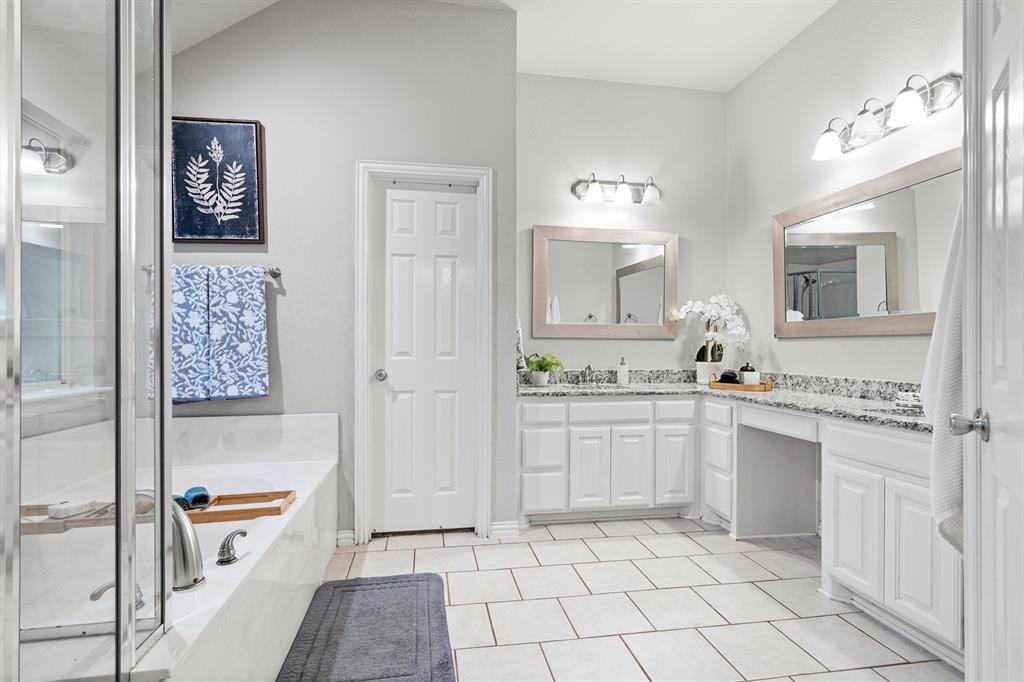 1501 Valley Creek Road Denton, TX 76205 - Photo 21 of 40 a kitchen with a cabinets and appliances