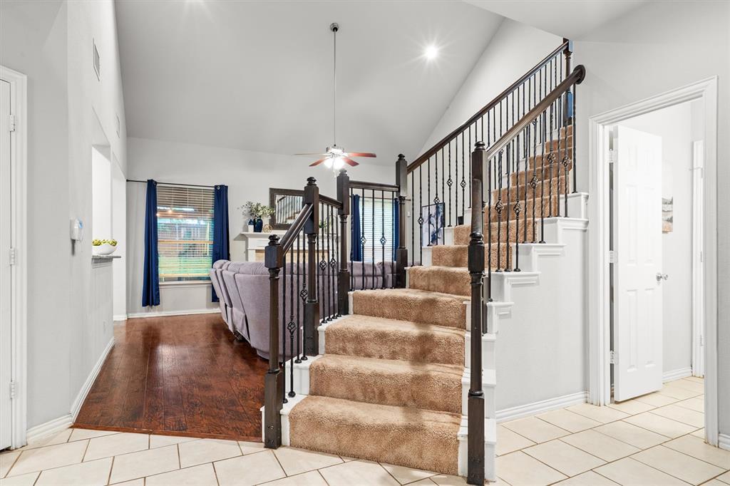 1501 Valley Creek Road Denton, TX 76205 - Photo 23 of 40 a view of entryway with livingroom and stairs