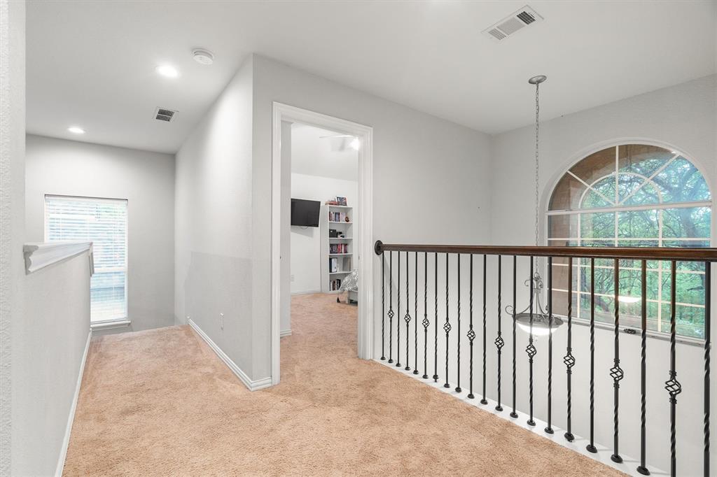 1501 Valley Creek Road Denton, TX 76205 - Photo 24 of 40 a view of a hallway view with staircase