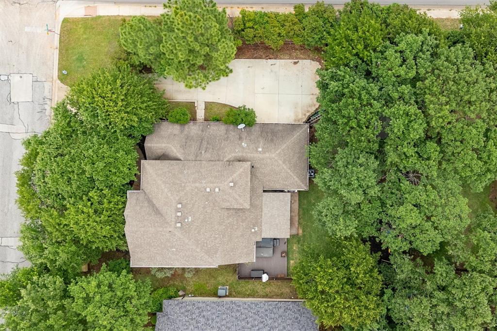 1501 Valley Creek Road Denton, TX 76205 - Photo 39 of 40 an aerial view of a house with a yard and garden