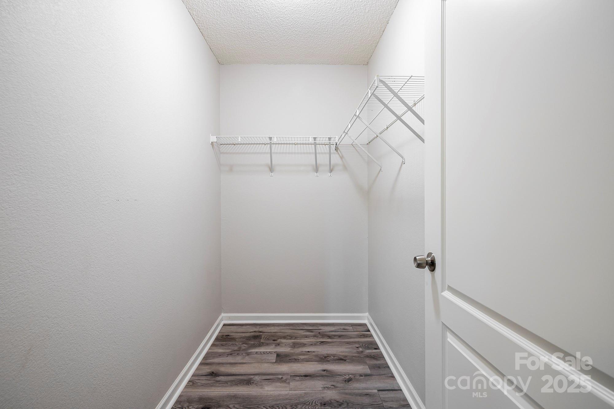 162 None Road Columbia, SC 29223 - Photo 15 of 24 a view of an empty walk in closet