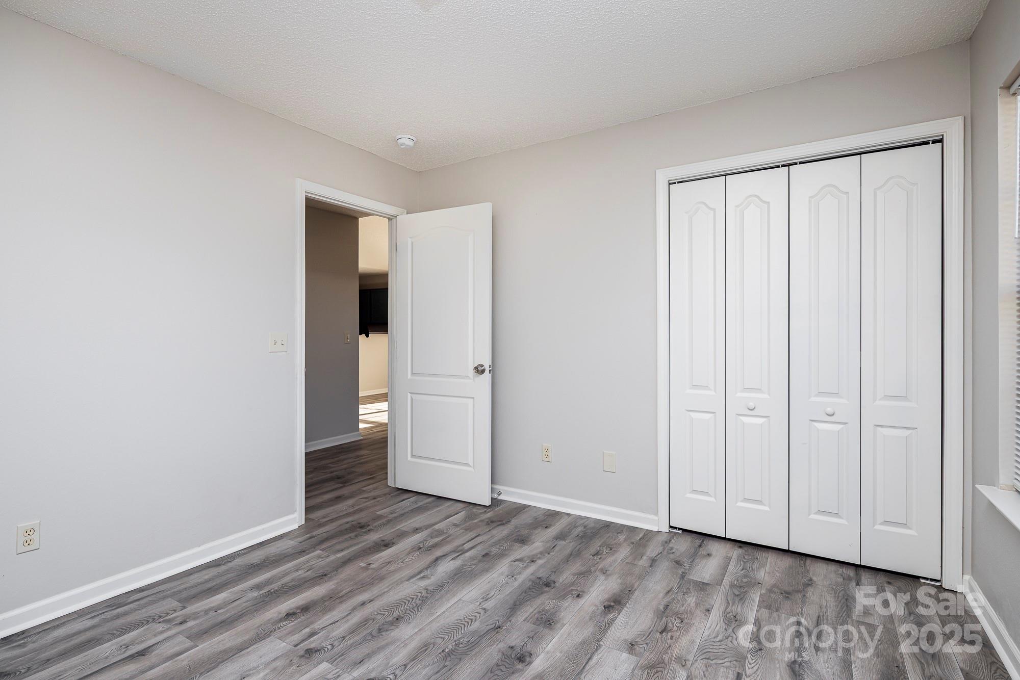 162 None Road Columbia, SC 29223 - Photo 16 of 24 a view of an empty room and wooden floor