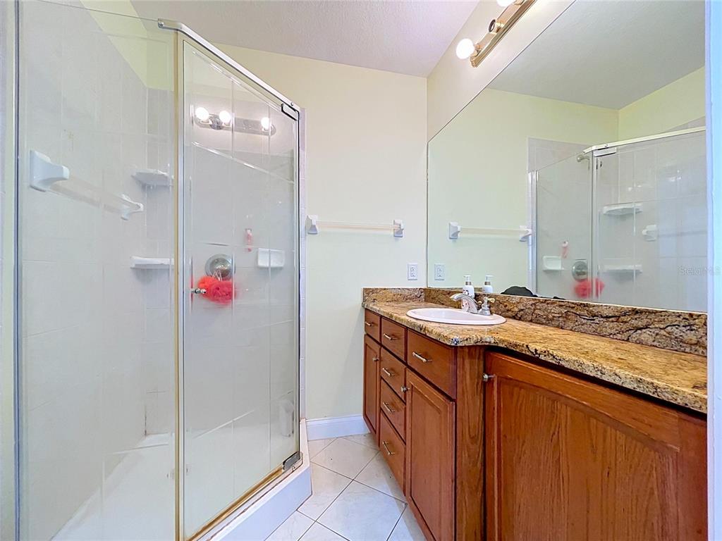 1360 South Waterview Drive Inverness, FL 34450 - Photo 28 of 100 a bathroom with a sink and a mirror