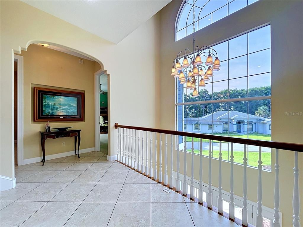 1360 South Waterview Drive Inverness, FL 34450 - Photo 32 of 100 a view of a porch with a table and chairs