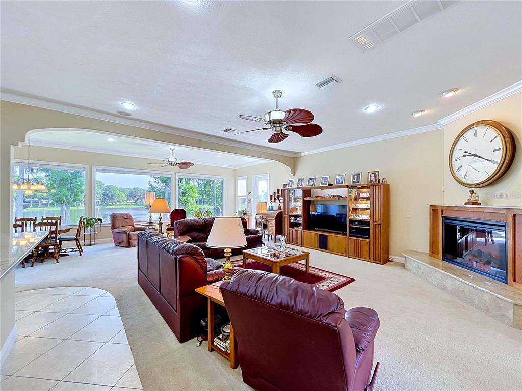 1360 South Waterview Drive Inverness, FL 34450 - Photo 38 of 100 a living room with furniture kitchen area and a large window