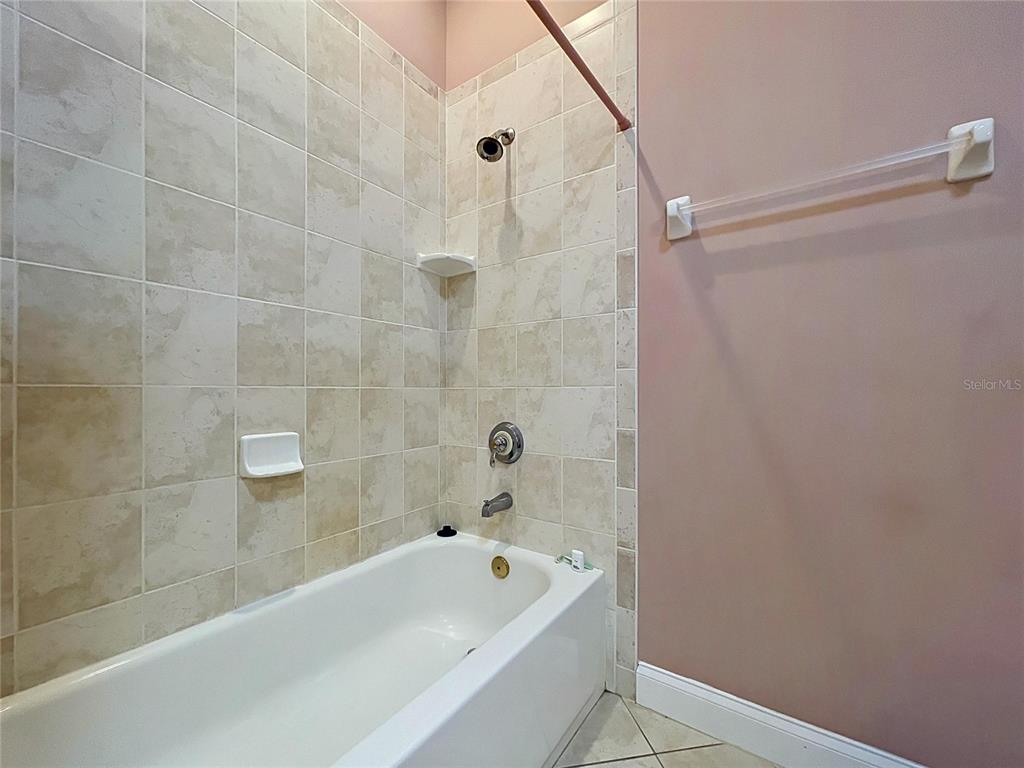 1360 South Waterview Drive Inverness, FL 34450 - Photo 62 of 100 a bathroom with a tub a sink and a shower