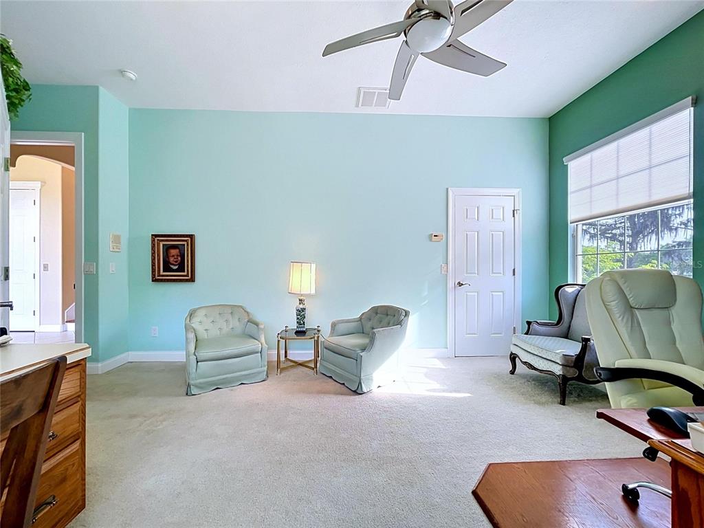 1360 South Waterview Drive Inverness, FL 34450 - Photo 66 of 100 a living room with furniture gym equipment and a window