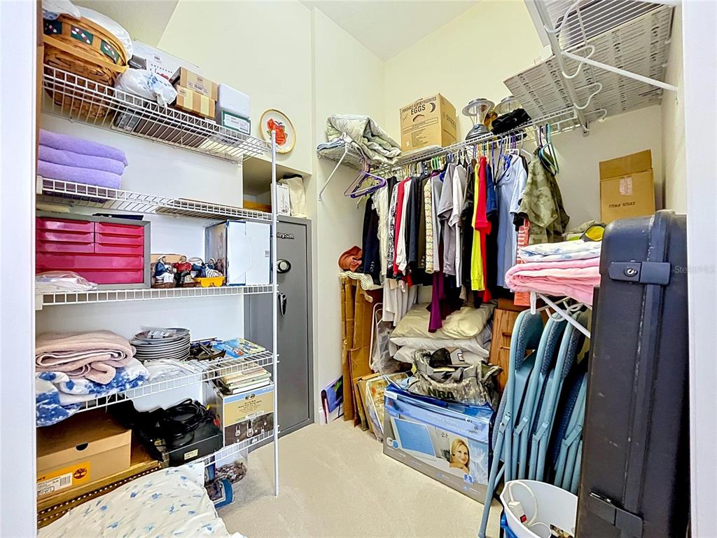 1360 South Waterview Drive Inverness, FL 34450 - Photo 68 of 100 a view of walk in closet with clothes and shoes