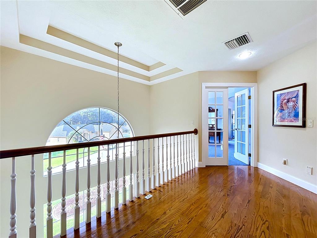 1360 South Waterview Drive Inverness, FL 34450 - Photo 73 of 100 a view of a hallway with wooden floor