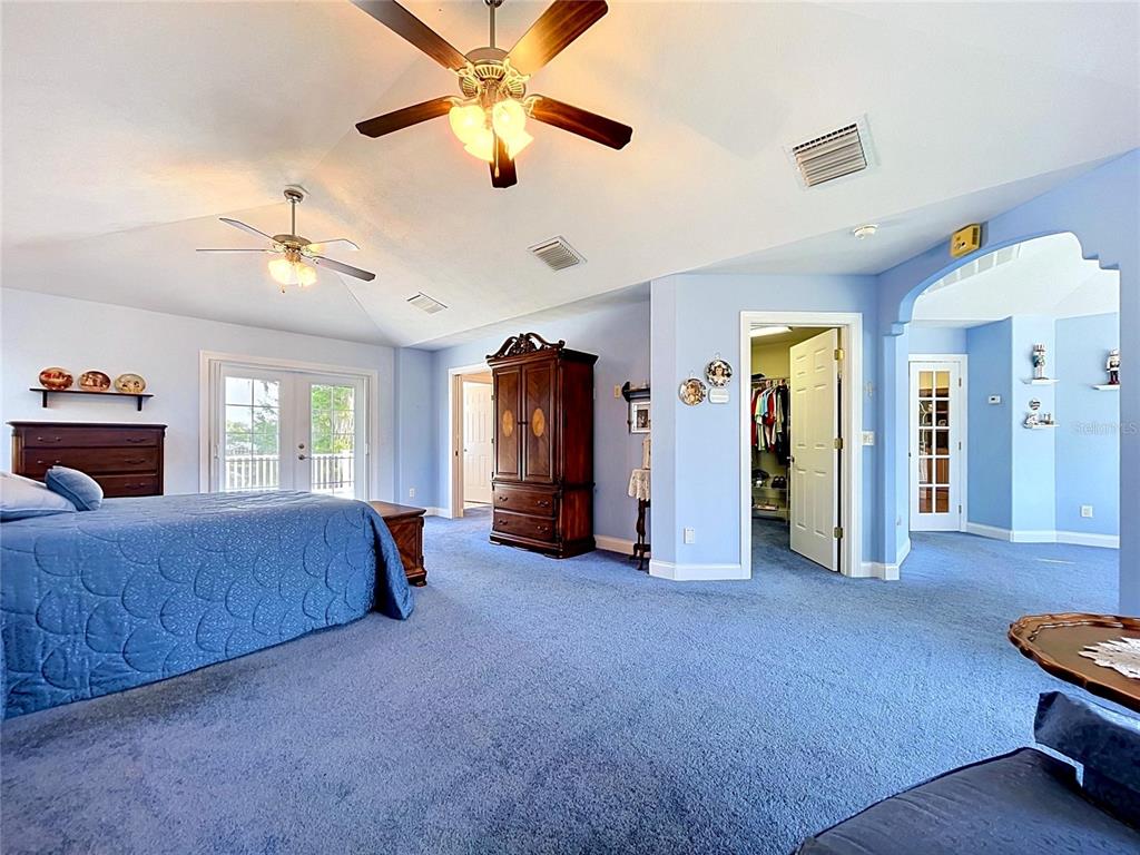 1360 South Waterview Drive Inverness, FL 34450 - Photo 75 of 100 a living room with furniture and a chandelier