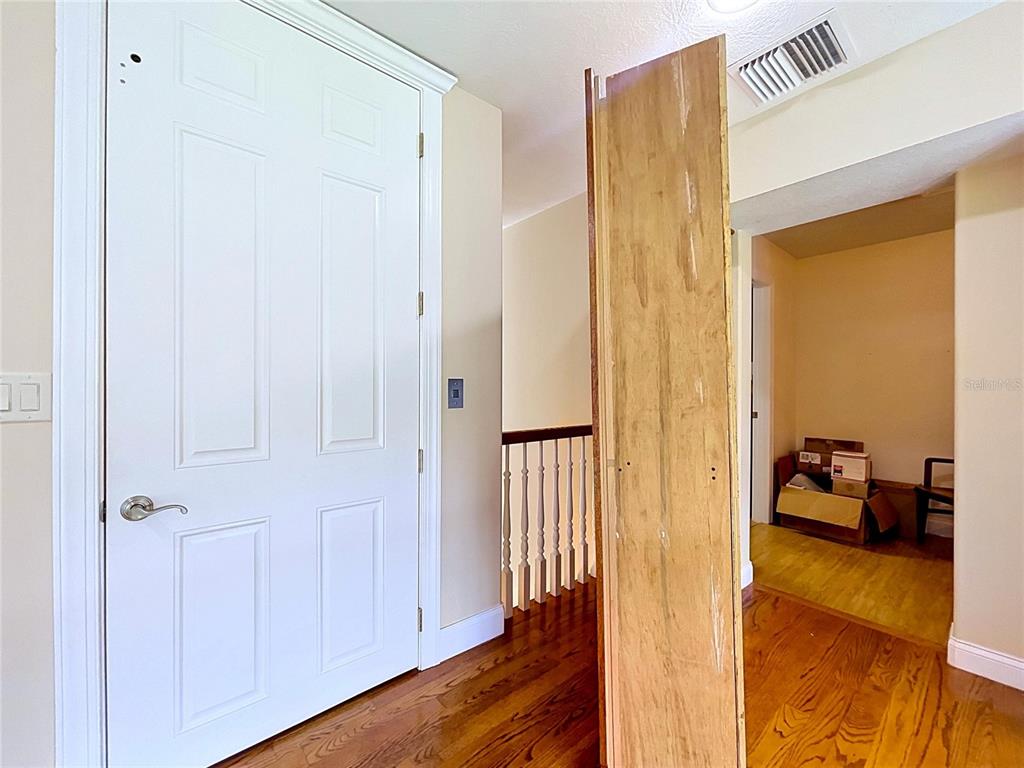 1360 South Waterview Drive Inverness, FL 34450 - Photo 85 of 100 a view of a bedroom from a hallway