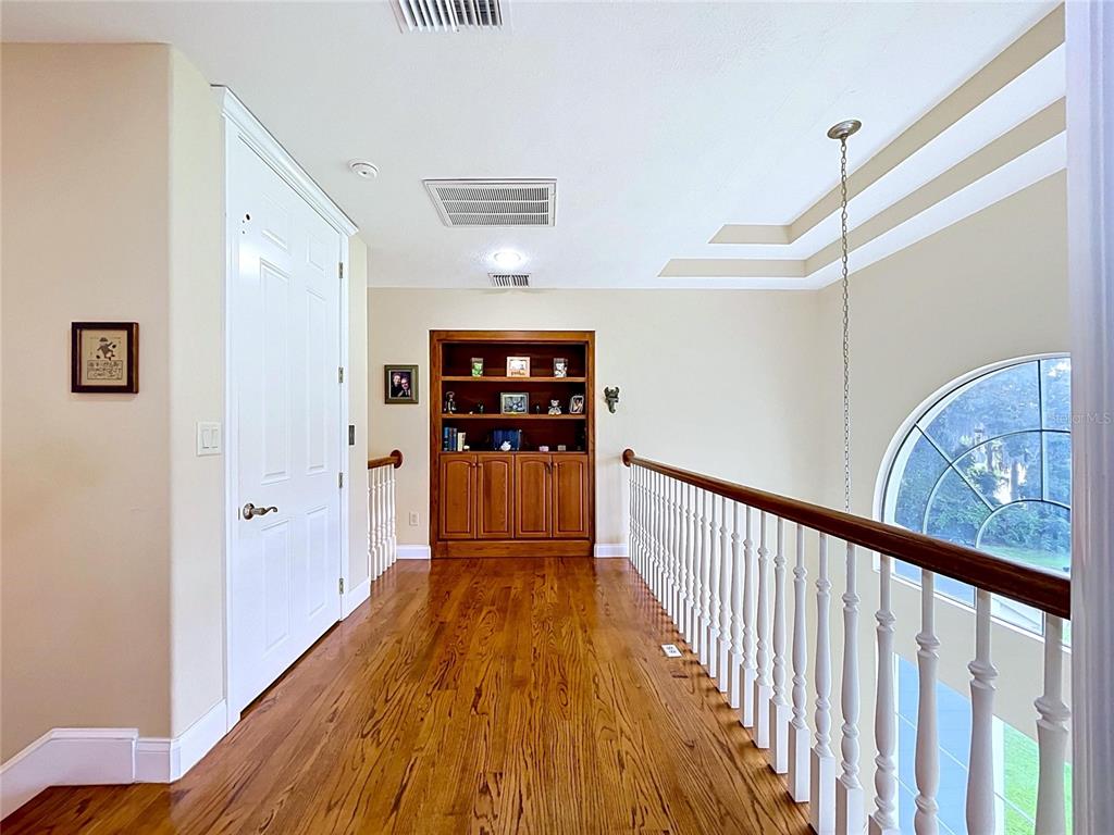 1360 South Waterview Drive Inverness, FL 34450 - Photo 87 of 100 a view of a hallway with wooden floor