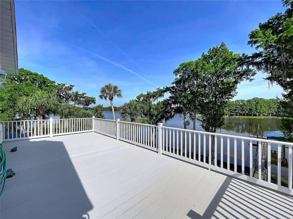 1360 South Waterview Drive Inverness, FL 34450 - Photo 88 of 100 a balcony with view of trees in the background