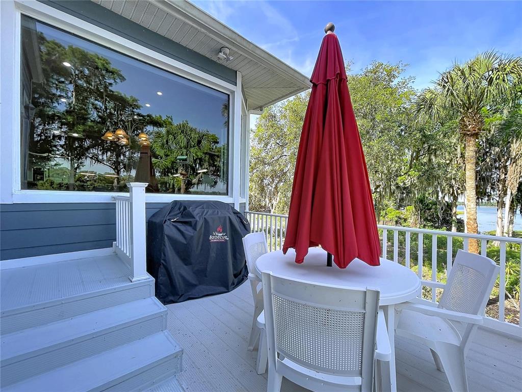 1360 South Waterview Drive Inverness, FL 34450 - Photo 90 of 100 a view of a two chairs in the patio