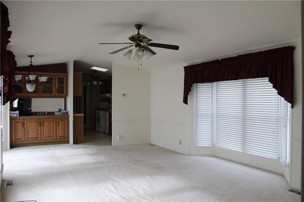 125 Hindman Road, Unit 43 Butler, PA 16001 - Photo 6 of 20 Living room with combined dining area.