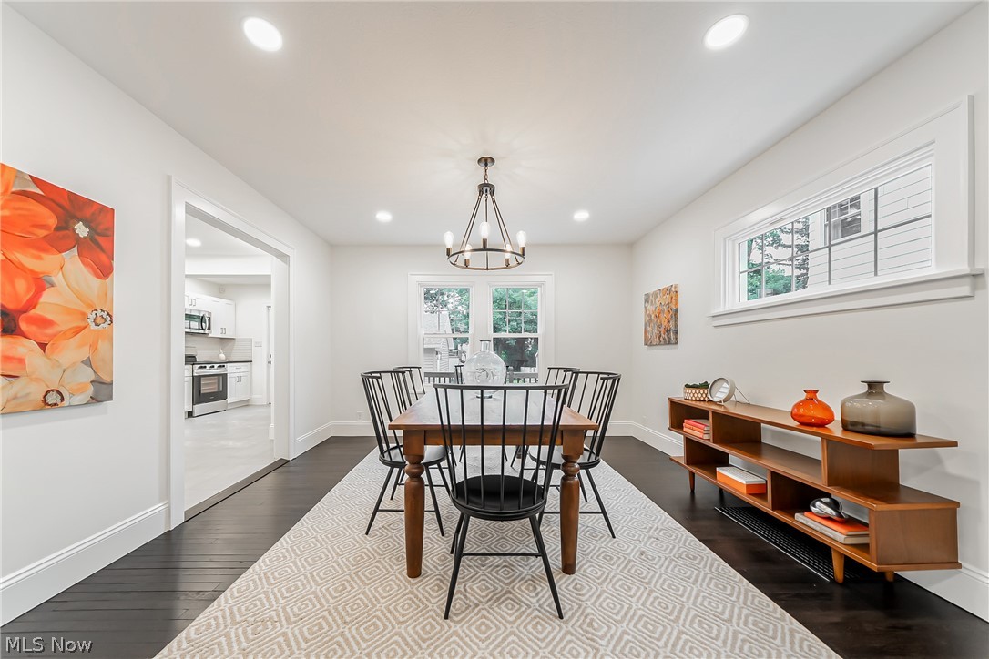 3947 Rosemond Road Cleveland Heights, OH 44121 - Photo 10 of 44 Dining room featuring a chandelier and dark hardwood / wood-style floors