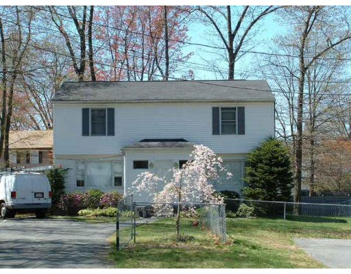 108 Carr Street Springfield, MA 01118 - Photo 1 of 6 a front view of a house with garden