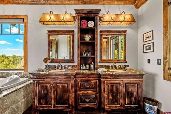 a view of a kitchen with brick walls
