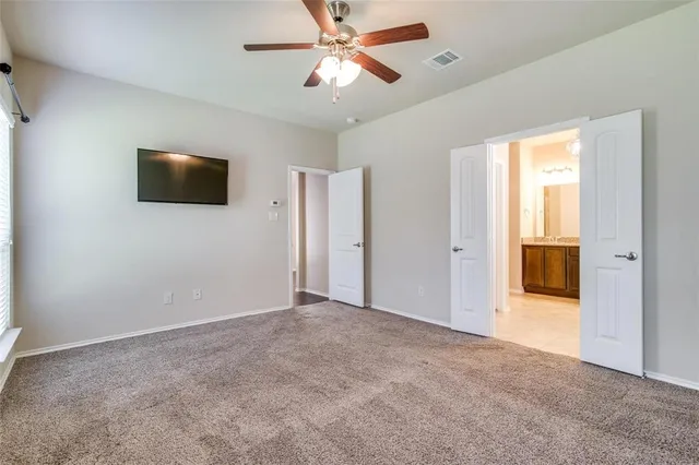 a view of a livingroom with a flat screen tv