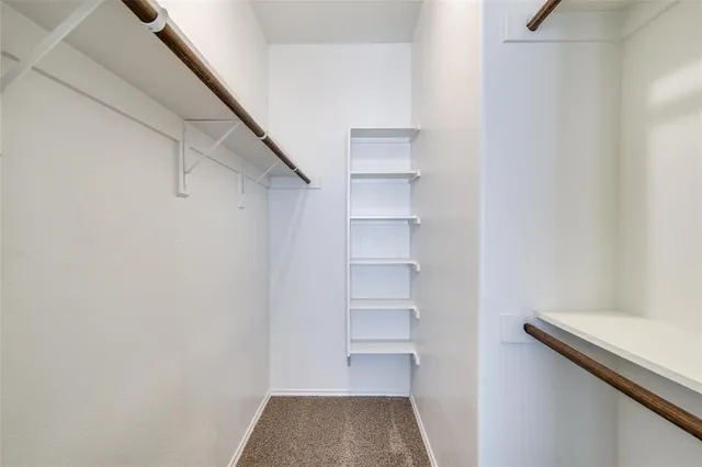 a view of a room with racks on the wall