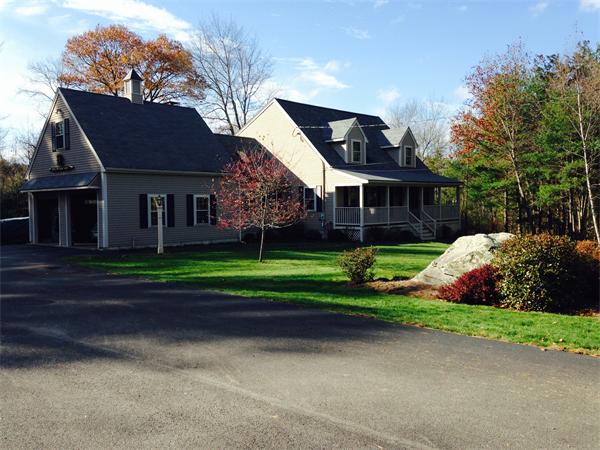 16 Parish Road Georgetown, MA 01833 - Photo 30 of 30 a front view of house with garden