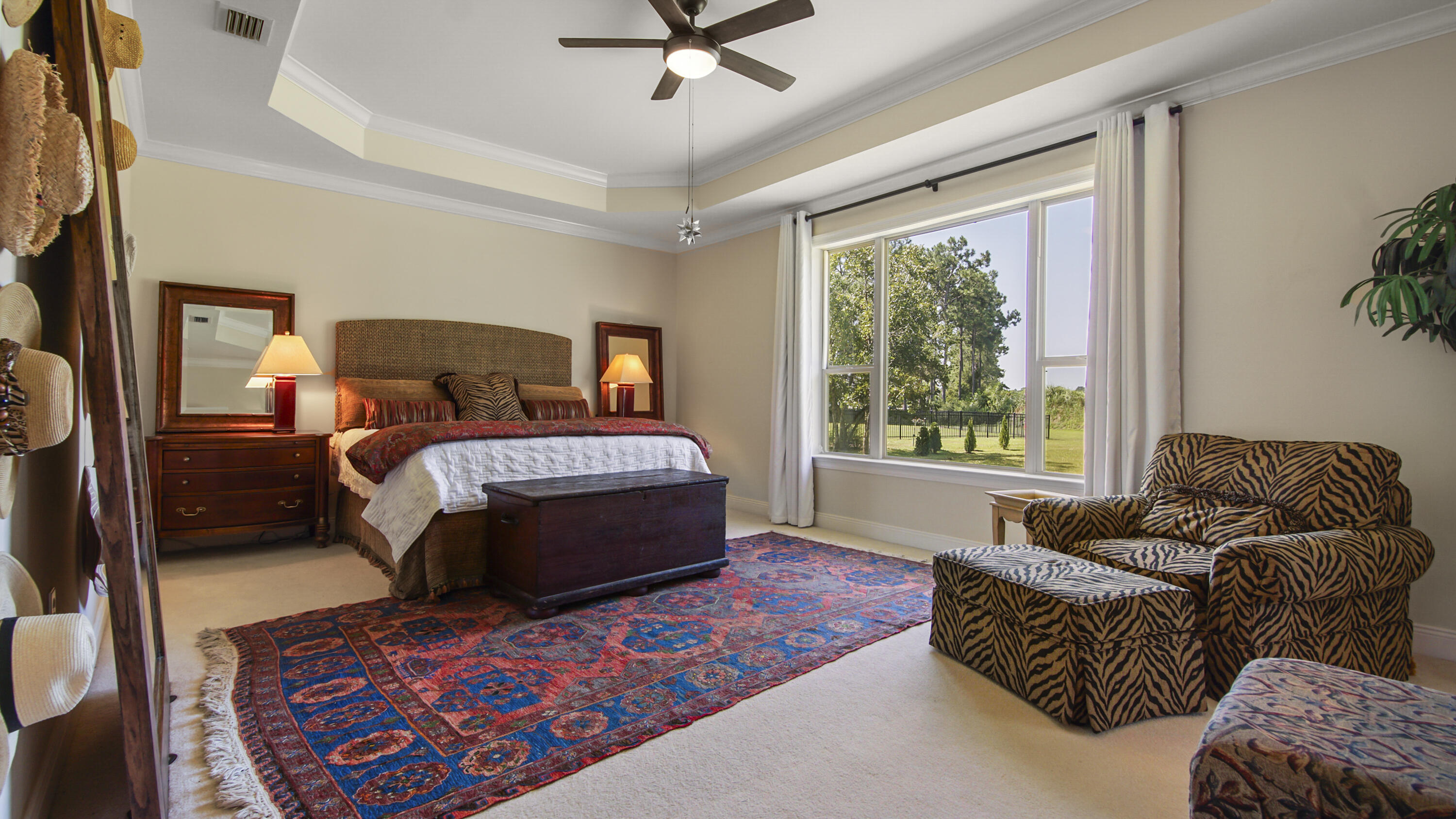 1464 Brushed Dune Circle Freeport, FL 32439 - Photo 18 of 62 a bedroom with a bed couch and window