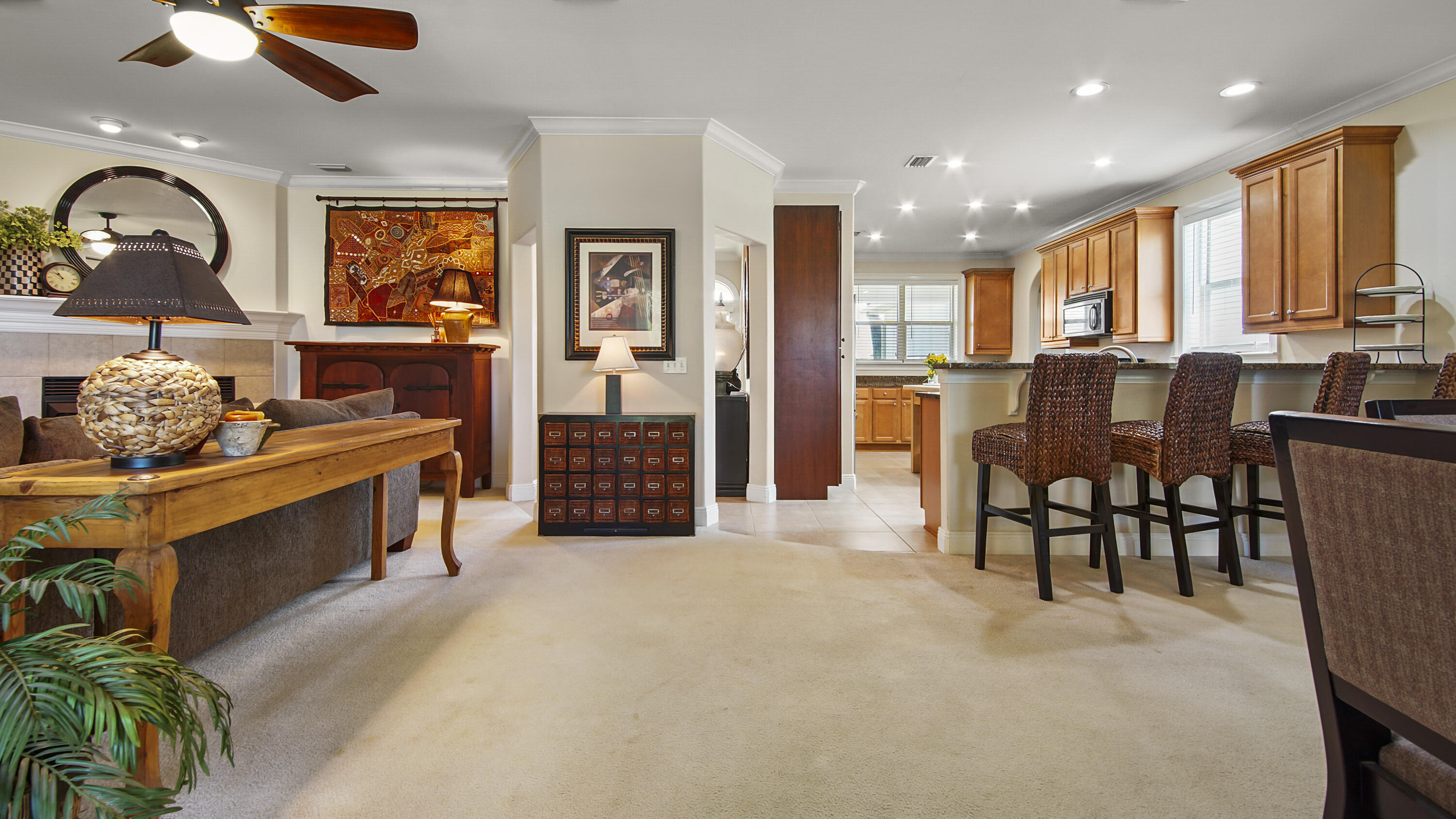 1464 Brushed Dune Circle Freeport, FL 32439 - Photo 34 of 62 a living room with furniture a dining table and chairs
