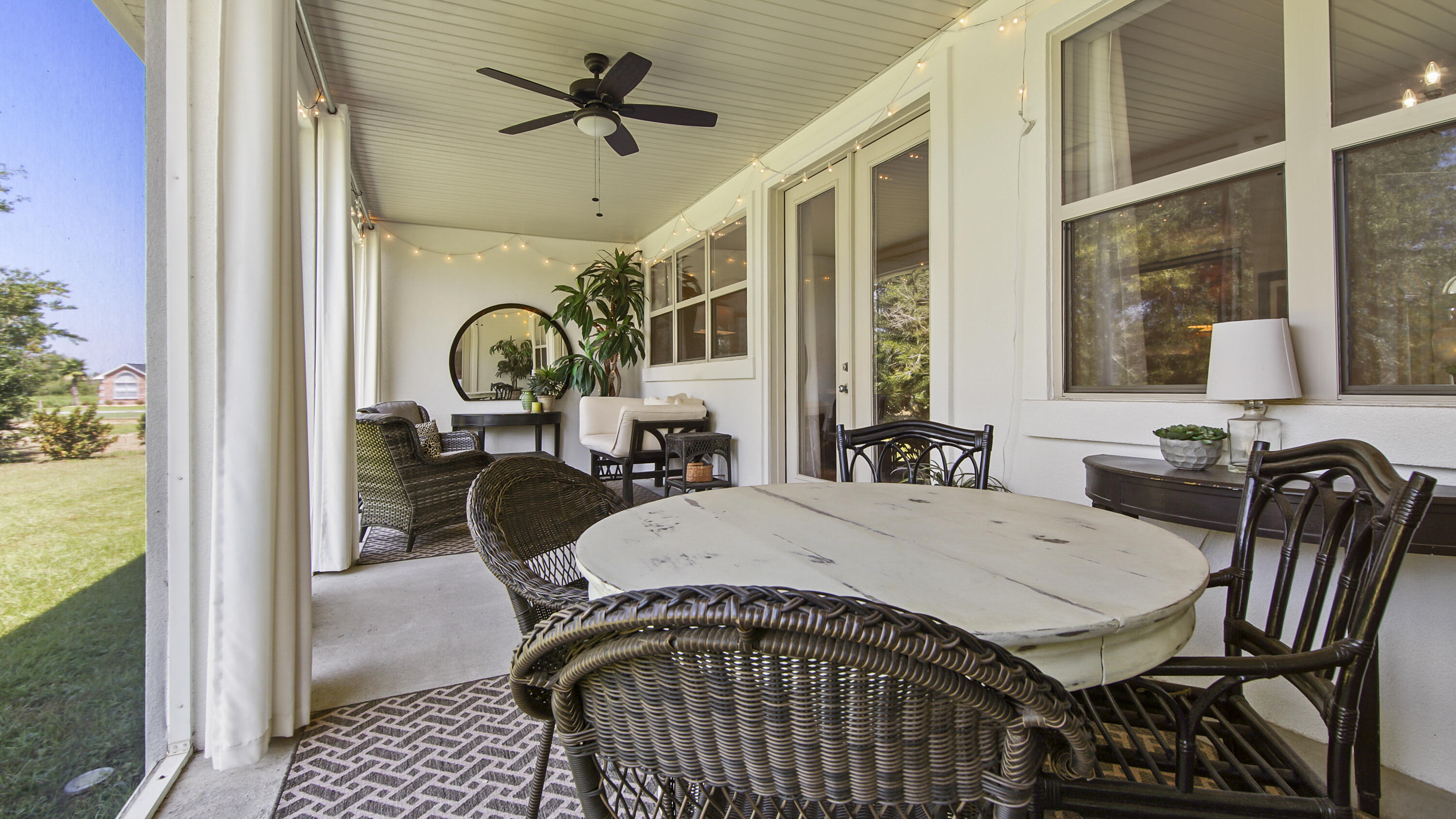 1464 Brushed Dune Circle Freeport, FL 32439 - Photo 37 of 62 a view of a dining room with furniture window and outside view