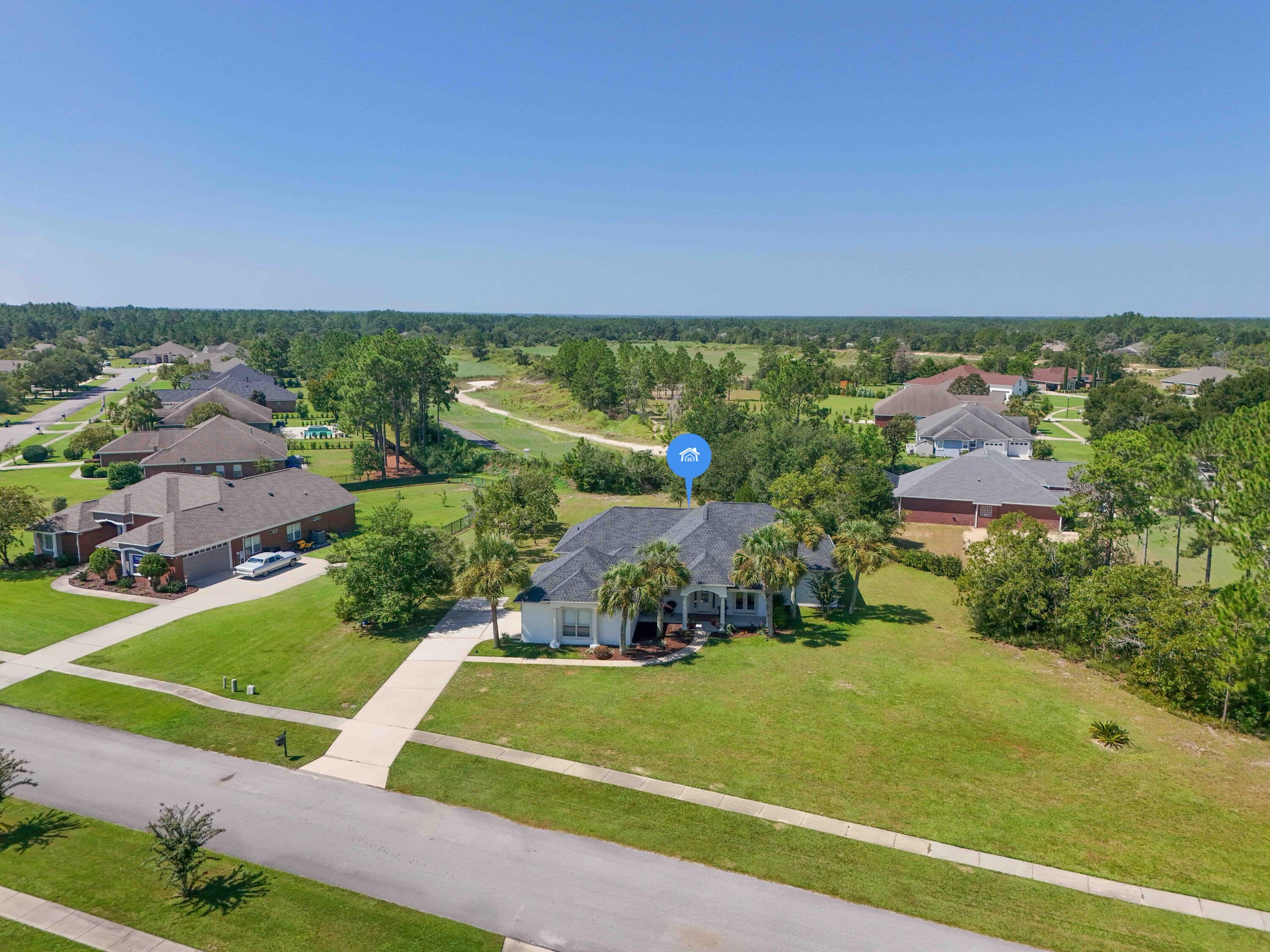 1464 Brushed Dune Circle Freeport, FL 32439 - Photo 46 of 62 an aerial view of a residential houses with outdoor space and street view