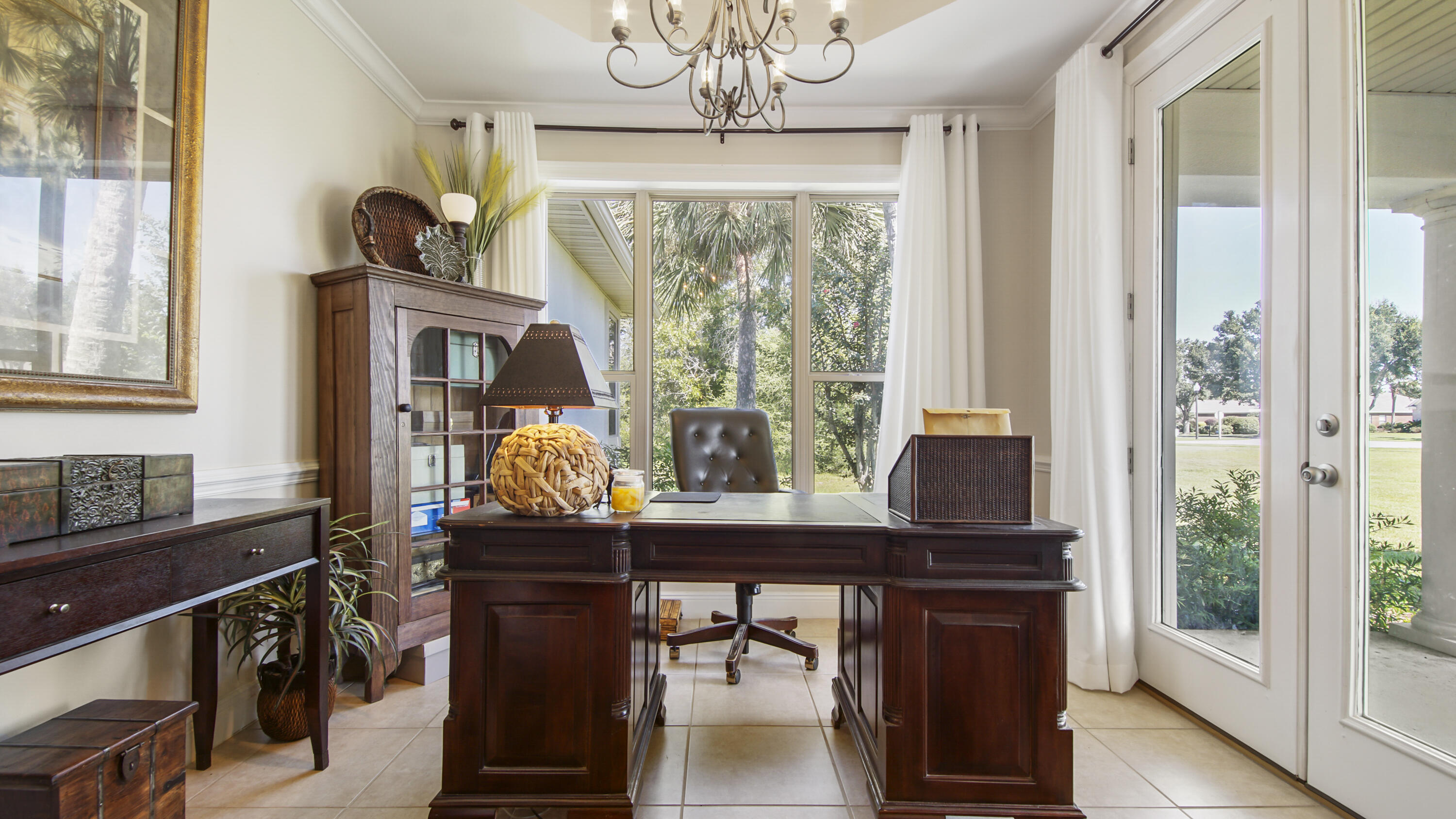 1464 Brushed Dune Circle Freeport, FL 32439 - Photo 6 of 62 a view of a dining room with furniture window and wooden floor