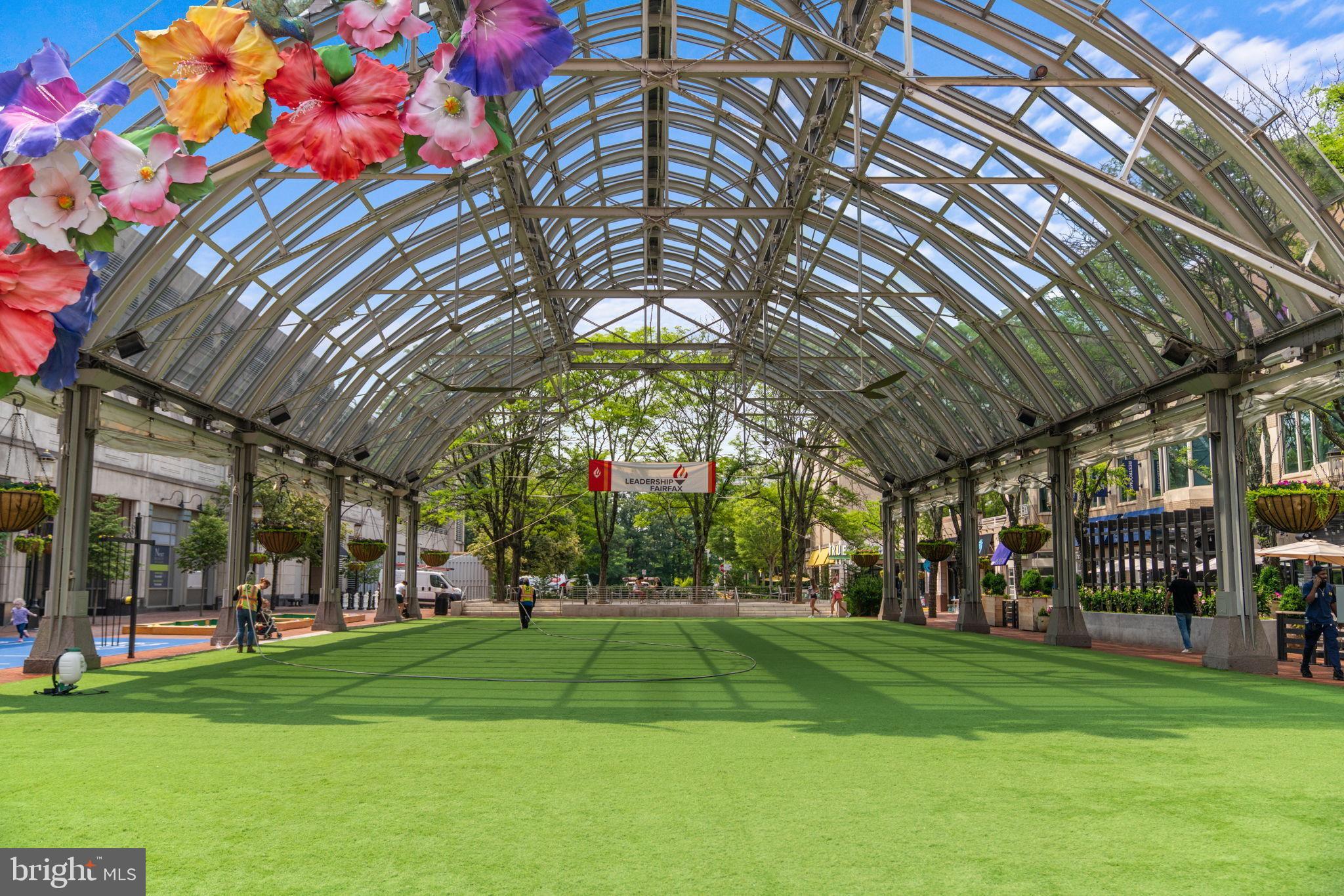 11587 Maple Ridge Road Reston, VA 20190 - Photo 103 of 119 a view of a park with lots of swings and slides