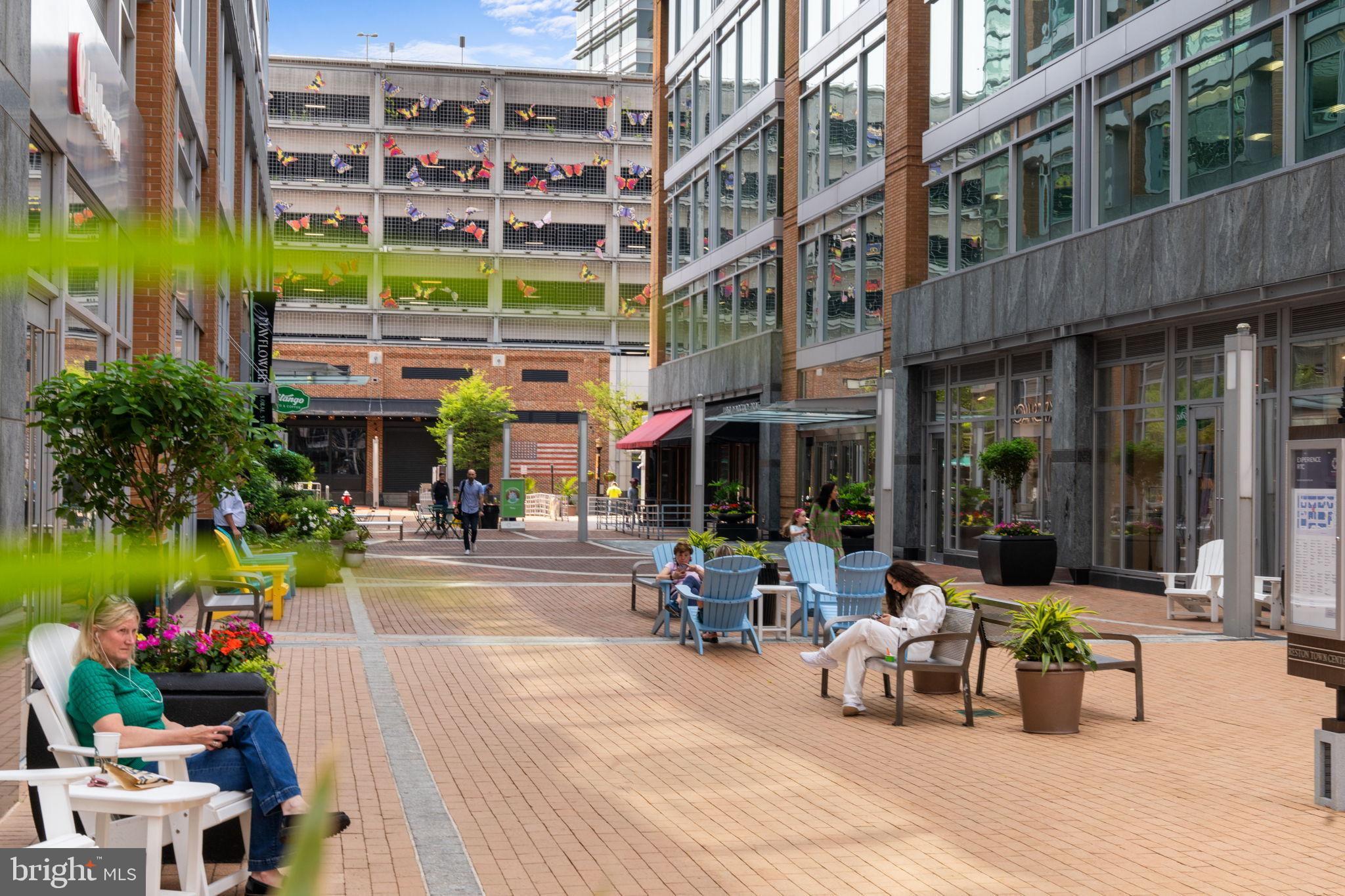 11587 Maple Ridge Road Reston, VA 20190 - Photo 110 of 119 a view of a building with sitting area