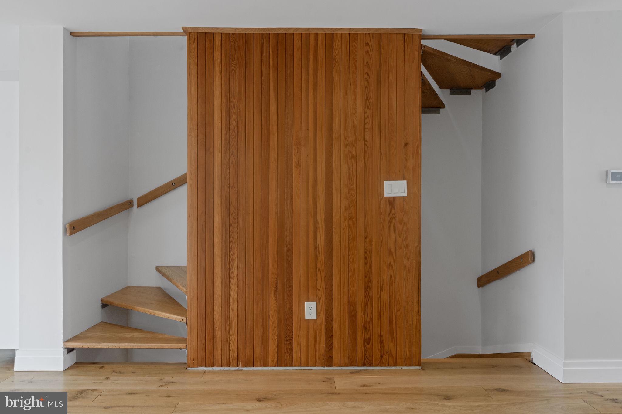 11587 Maple Ridge Road Reston, VA 20190 - Photo 22 of 119 a view of entryway with wooden floor