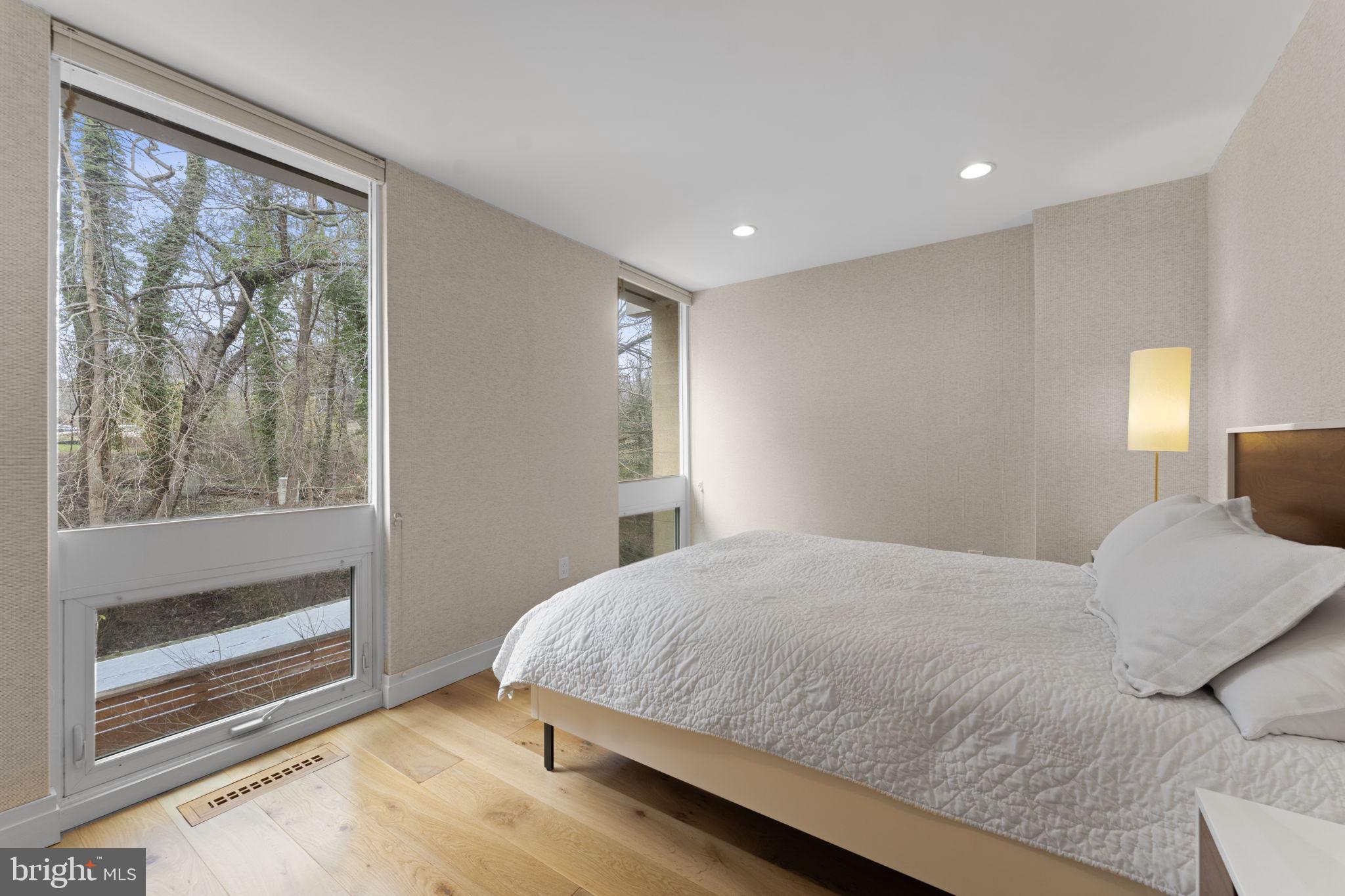 11587 Maple Ridge Road Reston, VA 20190 - Photo 34 of 119 a bedroom with a large bed and a window