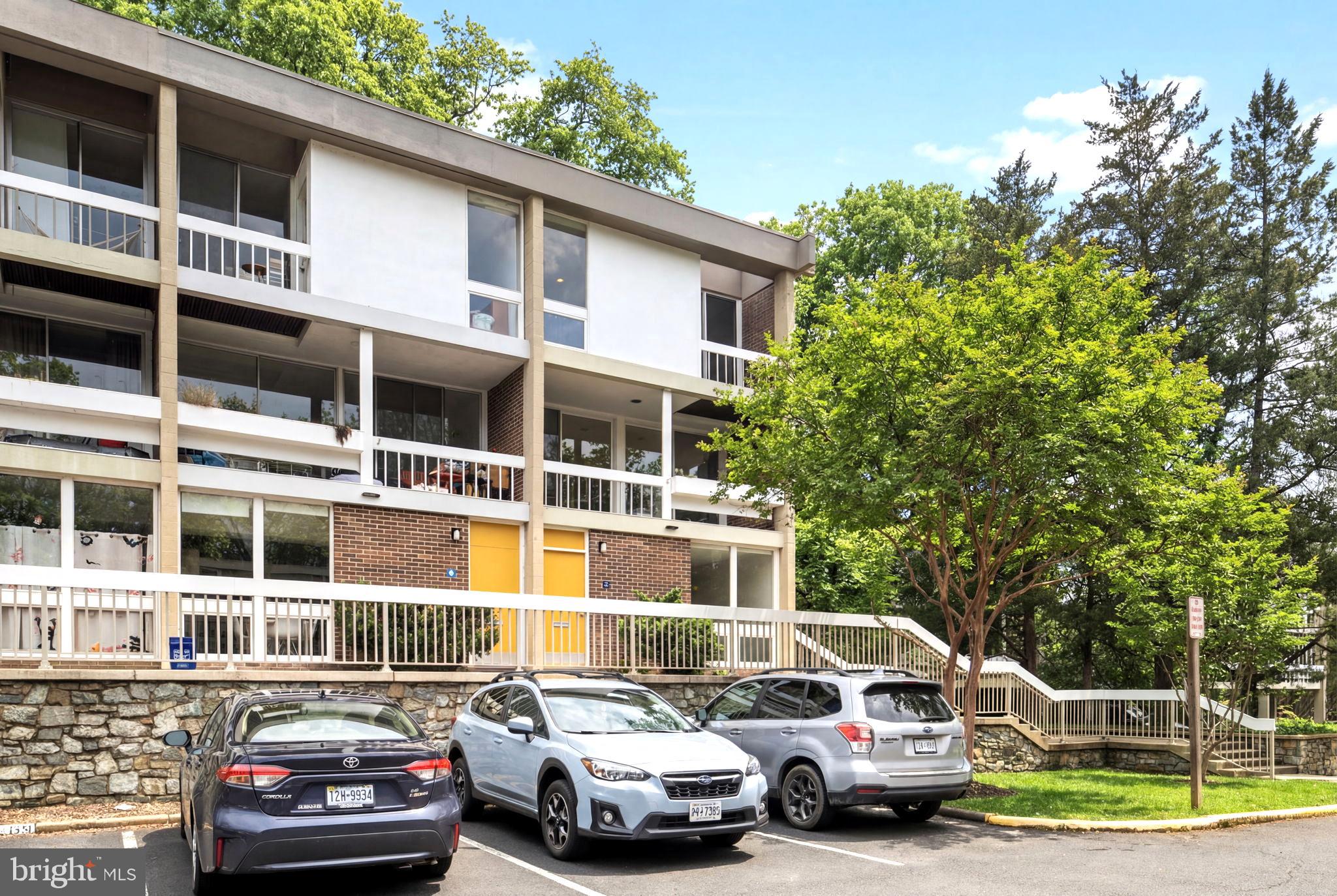 11587 Maple Ridge Road Reston, VA 20190 - Photo 44 of 119 a car parked in front of a house